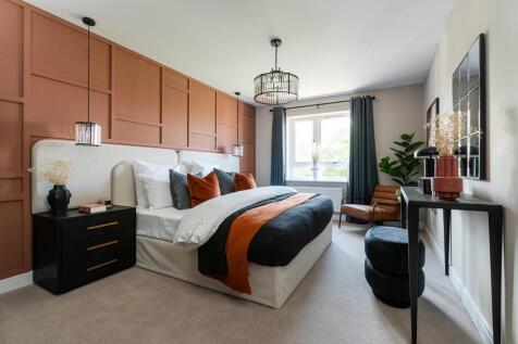 A generously sized bedroom 1