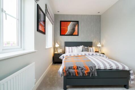 A double bedroom with built in cupboard