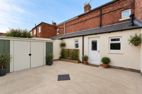 Tidy Daylight Courtyard with Olive Trees.png