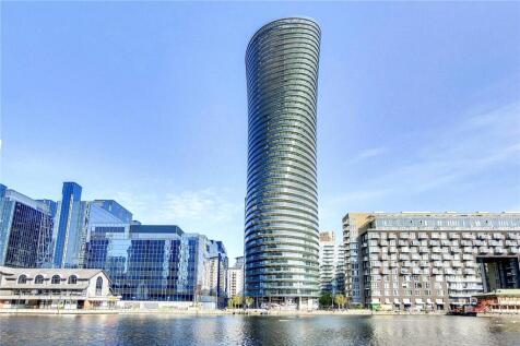 HIGH floor 1-bedroom apartment in the heart of Canary Wharf E14, this spacious apartment comprises of a large reception room with open-plan kitchen area, double bedroom, luxury bathroom and large priv