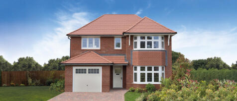 Detached red brick house with a garage and bay windows, set in a green garden with a wooden fence, u