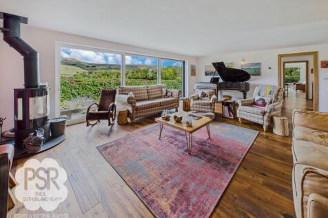 Snug Lounge with Stunning Views and Log Burner