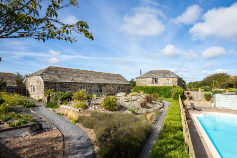 A charming single storey stone property overlooki