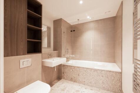 Step into serenity with this elegantly designed modern bathroom, combining functionality and style.