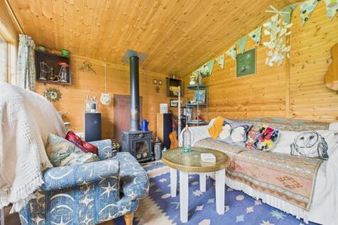 Wooden Outbuilding with Log Burner