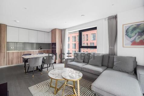 A stunning two-bedroom, two-bathroom apartment situated on an upper floor of Hawksbury Heights—the landmark high-rise tower within the prestigious Park & Sayer development at Elephant Park.