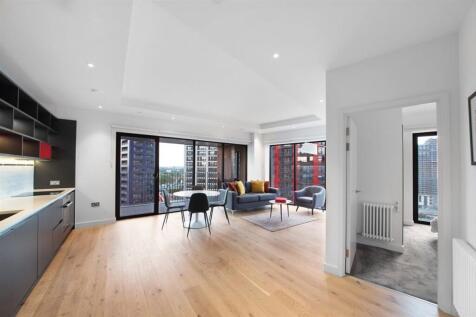 A well-presented one-bedroom apartment spanning over 610sqft, set on a high floor of this contemporary development. Boasting floor to ceiling windows, a sleek design and private balcony.