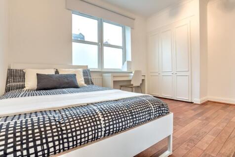 A well-proportioned four-bedroom, two-bathroom apartment located in Imperial Court on Kennington Lane, offering spacious accommodation in a convenient and well-connected South London location.