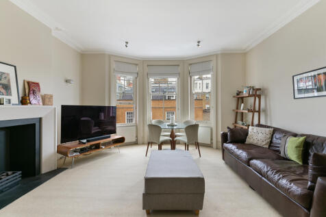 A beautifully presented and exceptionally spacious two bedroom apartment situated in a secure mansion block in the heart of Kensington.This elegant residence combines impressive proportions and period