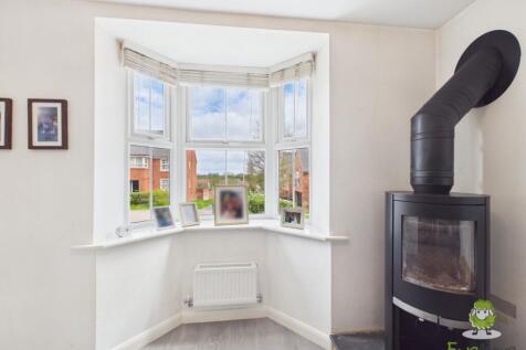Front bay window and log burner - Ewemove Whitchur