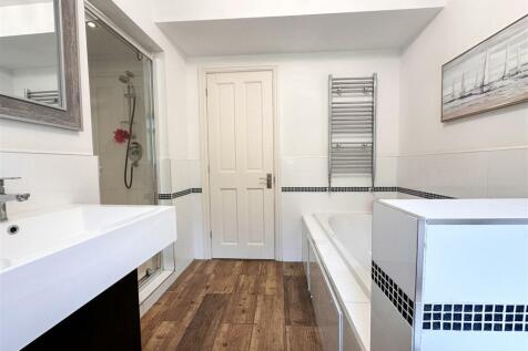 FAMILY BATH AND SHOWER ROOM