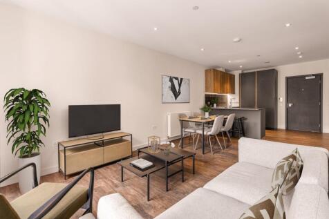 Experience contemporary comfort in this chic urban living space, perfect for relaxation and entertainment.