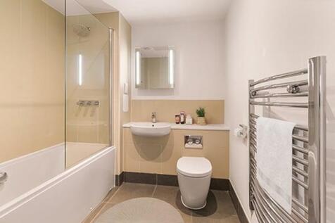 Explore the elegance of this stylishly designed bathroom with contemporary fixtures.