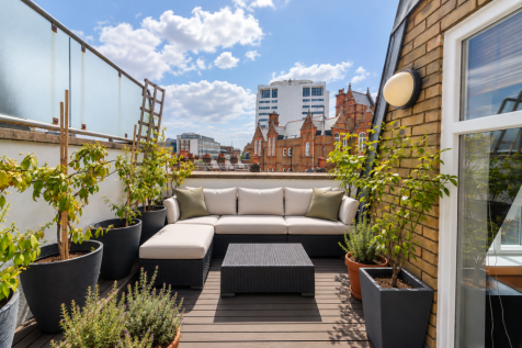 Clean Cushions on a City Rooftop Terrace