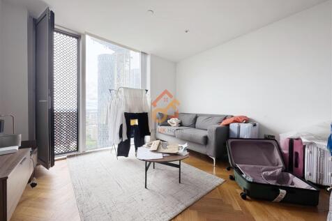 Let UK Home are delighted to offer this stunning and spacious two-bedroom apartment in Manchester's premiere residential address, Deansgate Square. This property comprises a large bright open plan kit