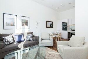 Modern two bedrooms, two bathrooms apartment on the ground floor of Roman House. This furnished apartment includes an inviting living and dining space, fitted kitchen with integrated appliances, wood