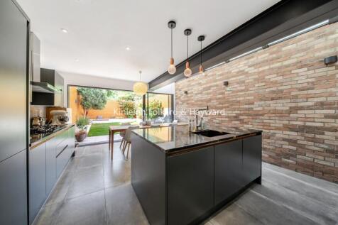 Beautifully renovated and finished to an exceptional standard throughout, this superb four-bedroom family home offers stylish and contemporary accommodation arranged over three floors, with two bathro