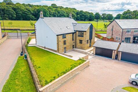 Aerial of rear and park beyond
