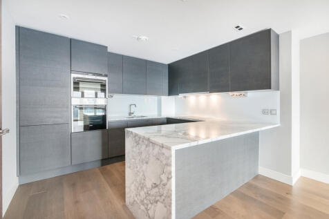 Stunning 2 bed, 2 bath riverside apartment with parking to let in Brunswick House, Fulham Reach.