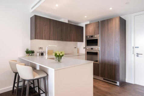 Experience culinary elegance in this chic, modern kitchen design.