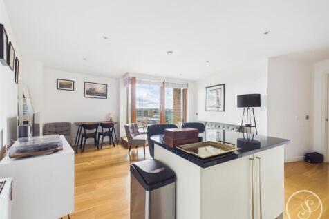 Stoneacre Properties are delighted to offer a beautifully presented one bedroom apartment situated on the 17th floor of Candle House. The property comprises; Spacious open plan lounge/kitchen which le
