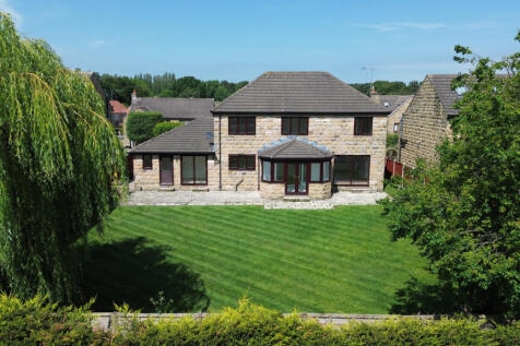A beautifully presented detached family home in a prestigious Shadwell cul-de-sac, offering high-specification accommodation, four bedrooms, three reception rooms and a double garage. Landscaped garde