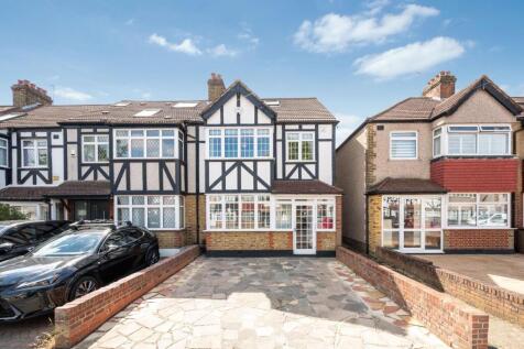 A beautifully appointed four bedroom family home offering generous living space across three floors, complete with two bathrooms, off street parking, and a detached garage. Ideally located within clos