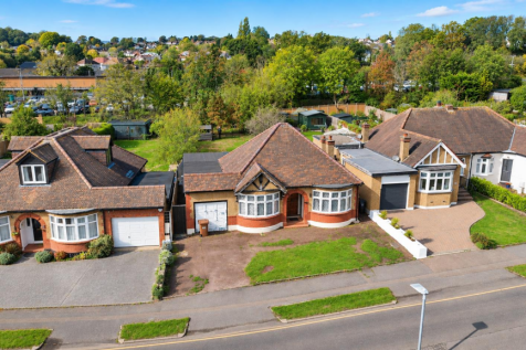 Sunny Aerial View of Suburban Bungalows (1).png