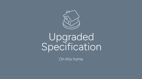 The image displays an icon of a house with the text "Upgraded Specification" and "On this home" belo