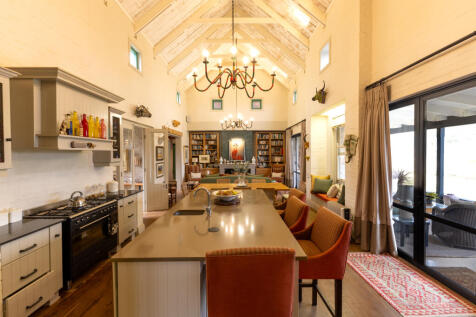Kitchen opens onto the patio views