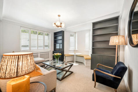 A beautifully refurbished two bedroom apartment, situated in one of the most desirable portered buildings in Chelsea, opposite the grounds of Burton Court and just south of the King's Road.