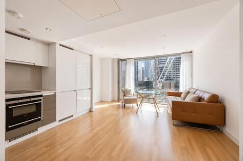 Modern 1-bed flat on 16th floor with Canary Wharf views, open plan kitchen, climate control, 24/7 concierge, gym, high-speed broadband, EPC B. Ideal for professionals or couples.