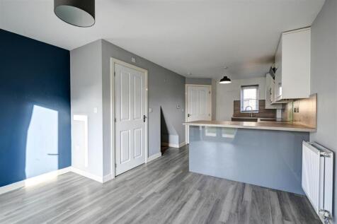 Lounge area towards kitchen 2.jpg