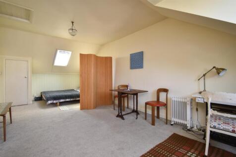 Open plan living space & bedroom