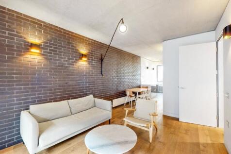 Available July A spacious two bedroom apartment located moments away from Old street Station. Accommodation comprises entrance hall, utility cupboard, reception room with open plan kitchen and access