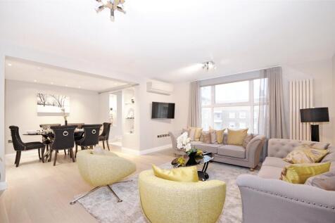 Set within an exclusive and highly sought-after purpose-built development on St John’s Wood Park, this exceptional three-bedroom apartment offers spacious, beautifully finished accommodation just mome