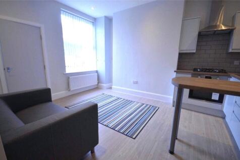 AVAILABLE AUGUST. Nestled in the heart of a charming village, this modern first-floor apartment offers a perfect blend of comfort and convenience. The apartment boasts one spacious bedroom and comes f