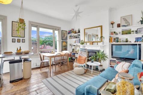 Nestled on Norwood Road in Herne Hill this two double bedroom split-level flat presents a wonderful opportunity for those seeking a good-sized home. Upon entering, there is an open plan reception and