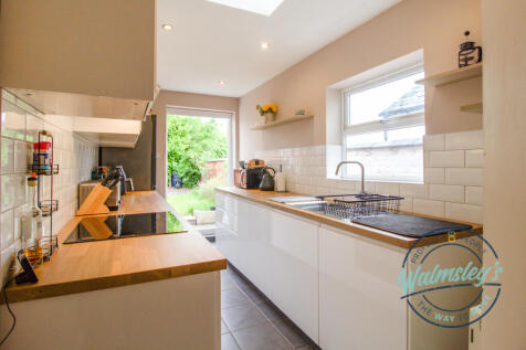 Kitchen with French doors skylight and utility are
