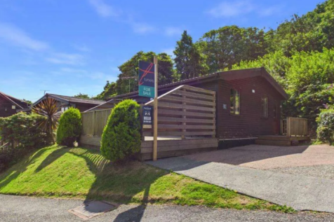 Exterior Of The Harbour View Holiday Lodge With Pr