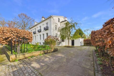 An exceptional Grade II listed semi-detached mansion, showcasing refined Victorian architecture enriched with classical Georgian influences. Set within substantial private grounds, the property enjoys