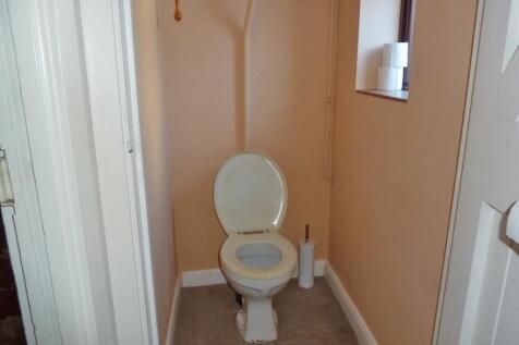 Toilet off rear hall