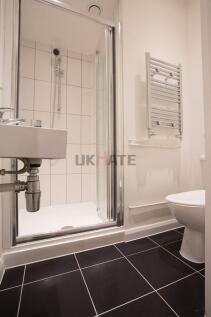 Modern and clean bathroom with a shower cubicle...