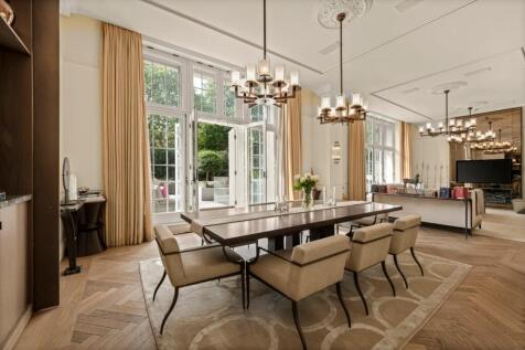 Occupying an enviable position on one of Connaught Place's most prestigious addresses, this magnificent 6,250 sq ft four-bedroom duplex apartment offers beautifully appointed living space across two f