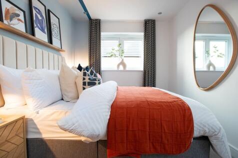 The second double bedroom beams with natural light