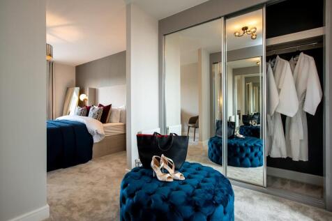 A useful dedicated dressing area in the main bedroom