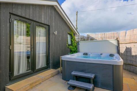 Rear terrace with hot tub