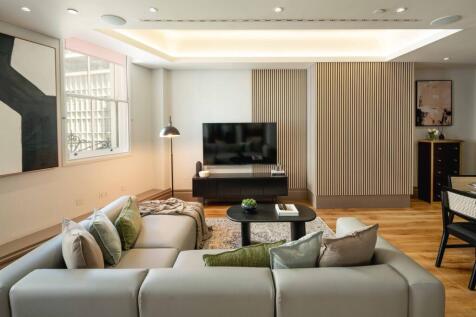 Contemporary living room with a large sectional...