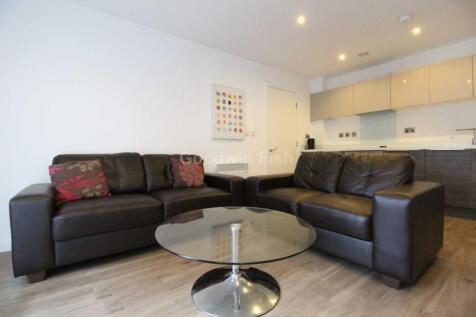 WITH SECURE PARKING - Edge Of Northern Quarter - Second Floor Corner Apartment - Spacious Living Room - Luxury Fitted Kitchen With Fully Integrated Appliances - Two Double Bedrooms - En Suite To Maste