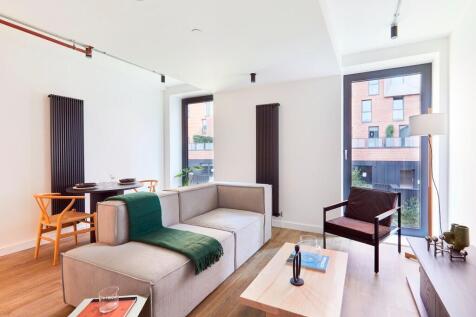 Deposit alternative option available! Available now! A stunning, 2nd-floor apartment with original features, exposed brick, and high vaulted ceilings, located in a Grade II listed warehouse. 24/7 conc